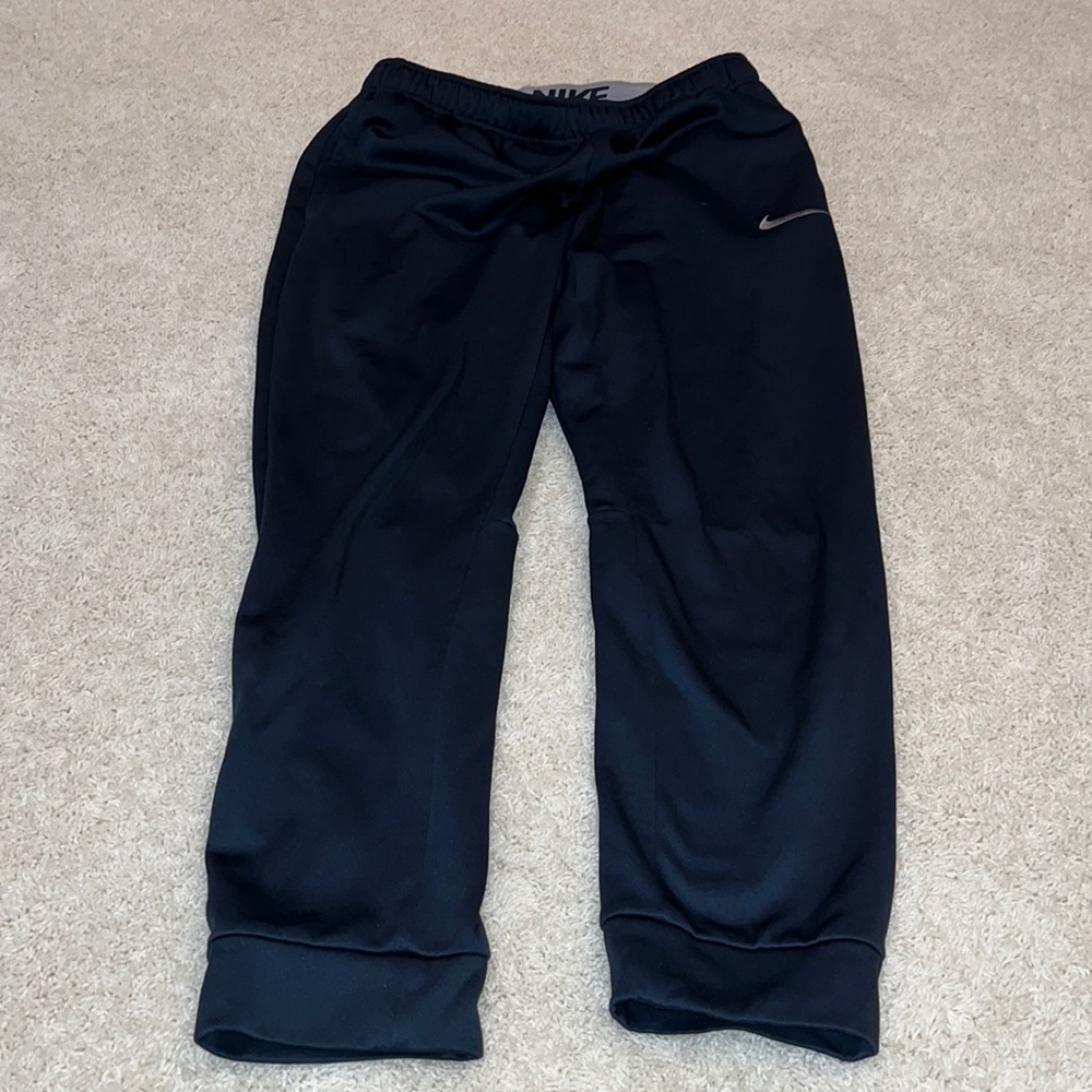 Dark blue Nike sweats